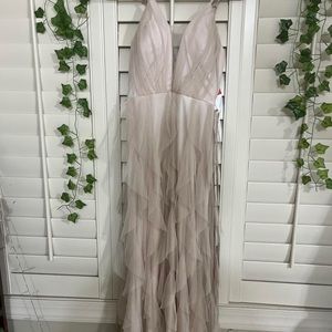 Tan long ruffle dress with optional bow as a belt!